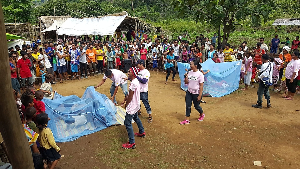 Locals participating in malaria day activities