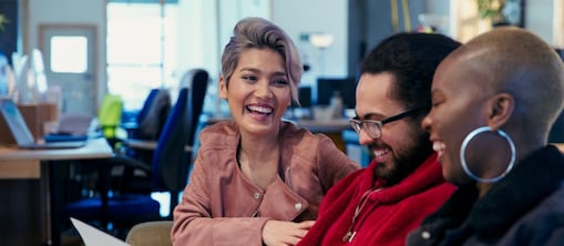 employees posing for a photo