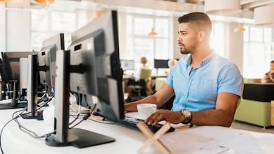 Male architect works on a project