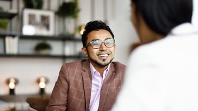 Two colleagues in discussion