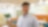 A man standing in a warm and vibrant office ambiance