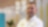 A man standing in front of the Shell Business Operations Manila office logo