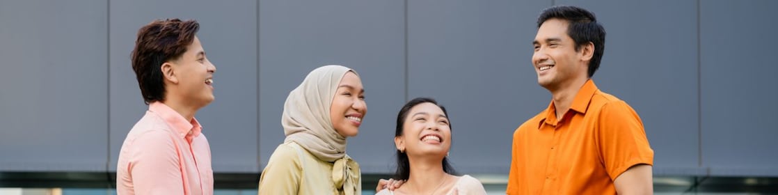 A young Shell female employee smiling.