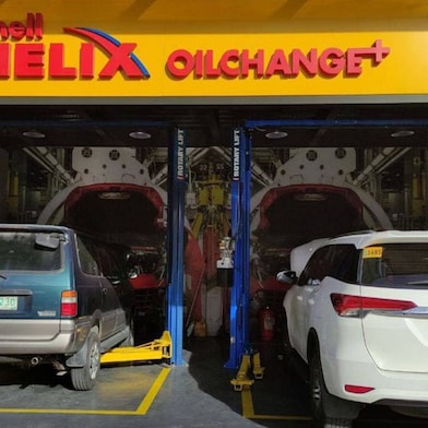 Two car standing in Shell Helix outlet
