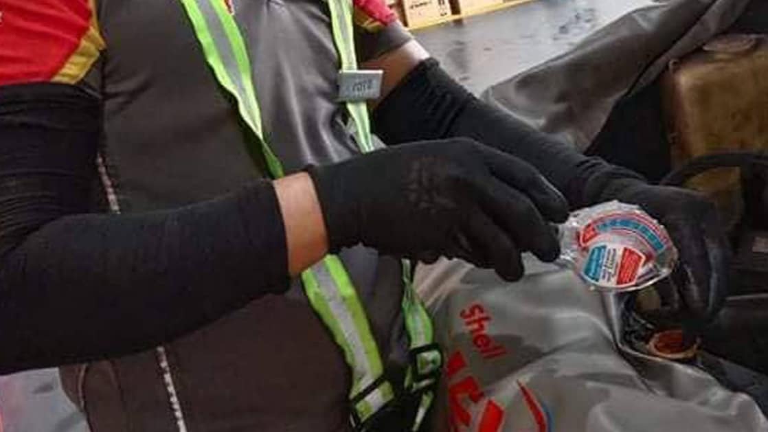 Shell technician repairing the car
