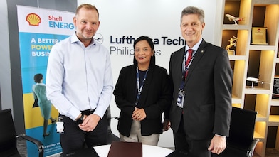 Three people standing