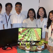 Team Agribon alongside their agricultural drone. The team created their agricultural machine to address the harsh weather and mountainous terrain of Nueva Vizcaya to help raise the efficiency in growing crops.