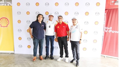 Group of four people clicking picture together