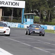 Two cars on a racetrack