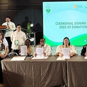 (L-R) Witnesses: Dr. Azucena M. Dayanghirang and Mr. Wesley Dela Cruz; Signees: Bombon Mayor Maria Luisa Angeles, Pasacao Municipal Councilor Junard Joel De Alday, Ms. Raiza V. Cusi of PSFI, Mr. Rommel V. Fuerte of World Vision Development Foundation, and Mr. Reginald M. Andal of Manila Water Foundation