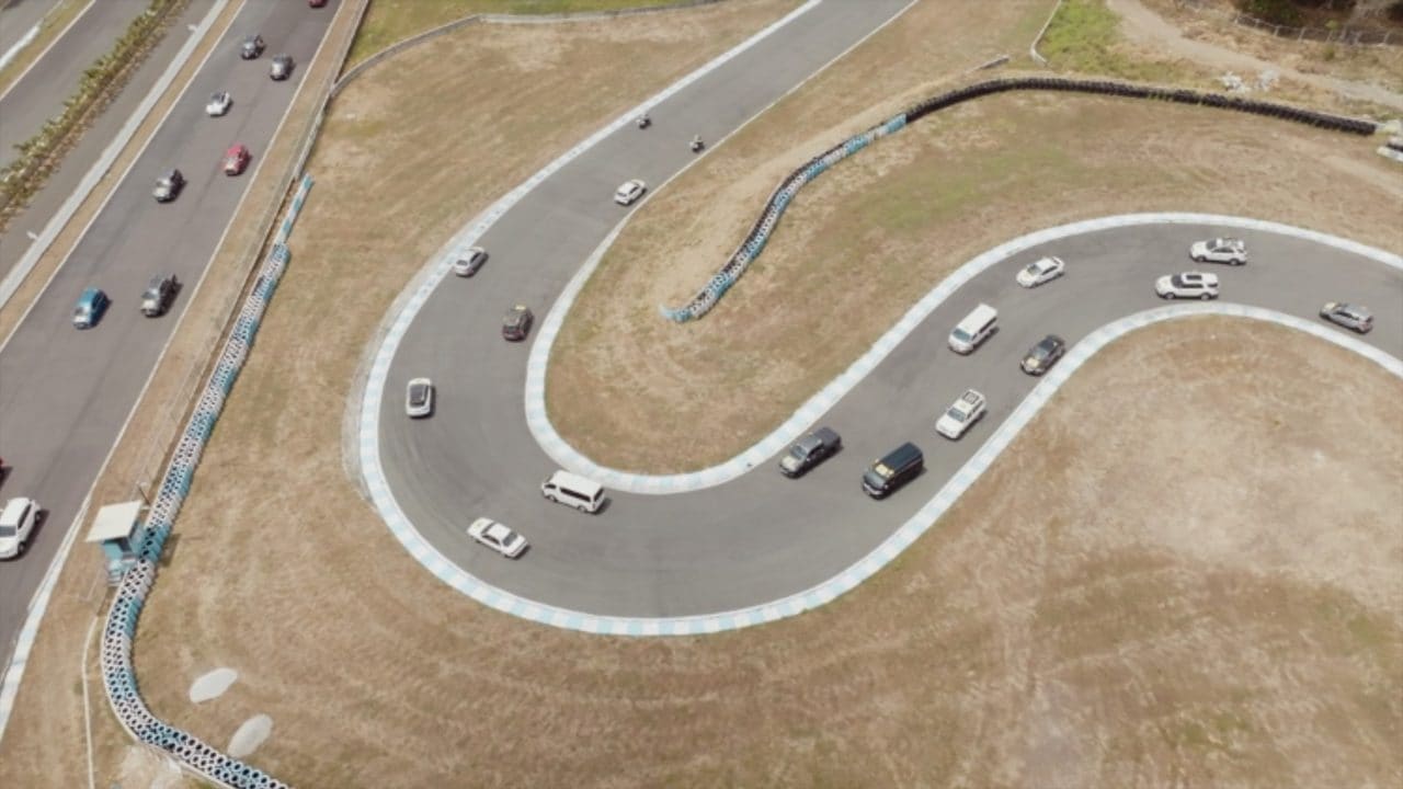 This is what a 110-vehicle caravan looks like as it snakes its way through the Clark Speedway.