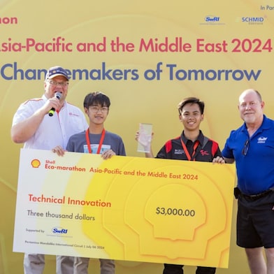 The Cardinals from Mapua University accept their $3,000 prize for the Technical Innovation Award at the Shell Eco-marathon Asia-Pacific and the Middle East 2024, celebrating their innovative approach to energy-efficient vehicle design.
