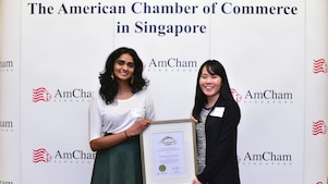 (From left to right) External Relations Advisors Niyati Pingali (left) and Nicole Pauh (right) receive the AmCham Cares for Corporate and Societal Excellence award on Shell’s behalf
