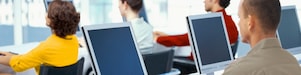 Employees using computers in an office