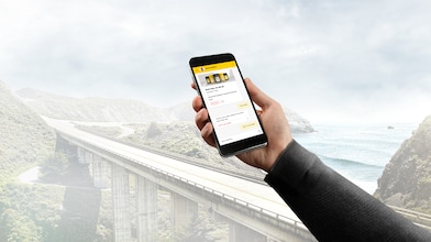 man holding a phone in his hand