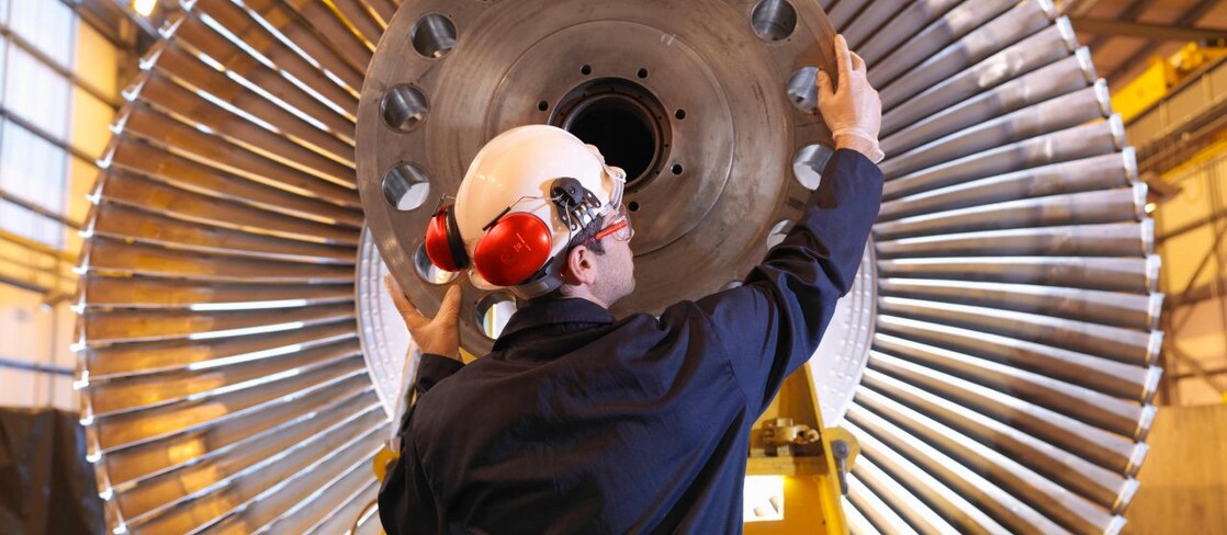 Engineer Inspecting Turbine