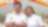 Man and woman standing in front of Shell station