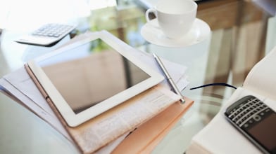 Tab and Coffee on Table