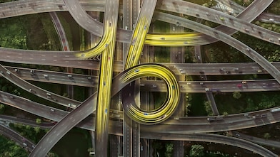 Light streaks in the middle of the road shaped into the number 15