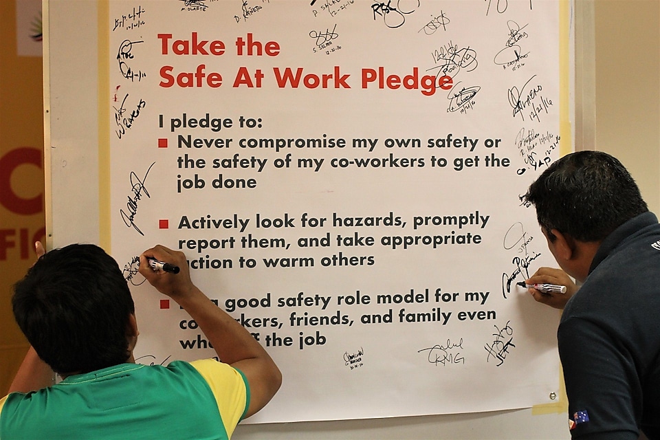 Participants sign as part of their commitment in taking safety a part of their everyday lives